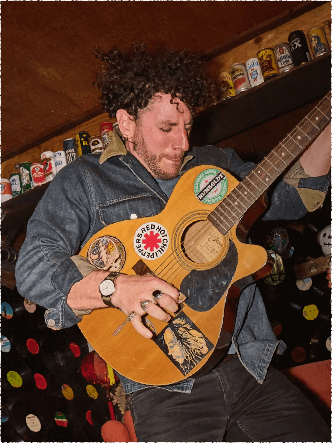 A man holding guitar